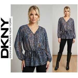 DKNY - loose fitting peplum style sheer blouse in contemporary print